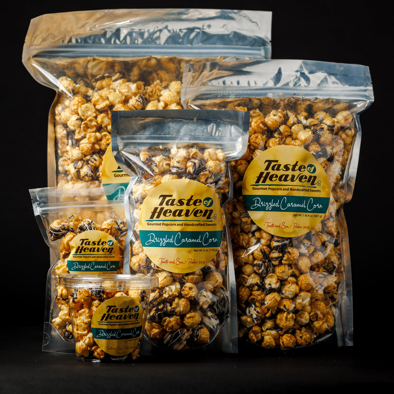 Multiple clear plastic bags of Drizzled Caramel Corn with product branding visible. The popcorn is coated with caramel and drizzled with both dark and white chocolate.