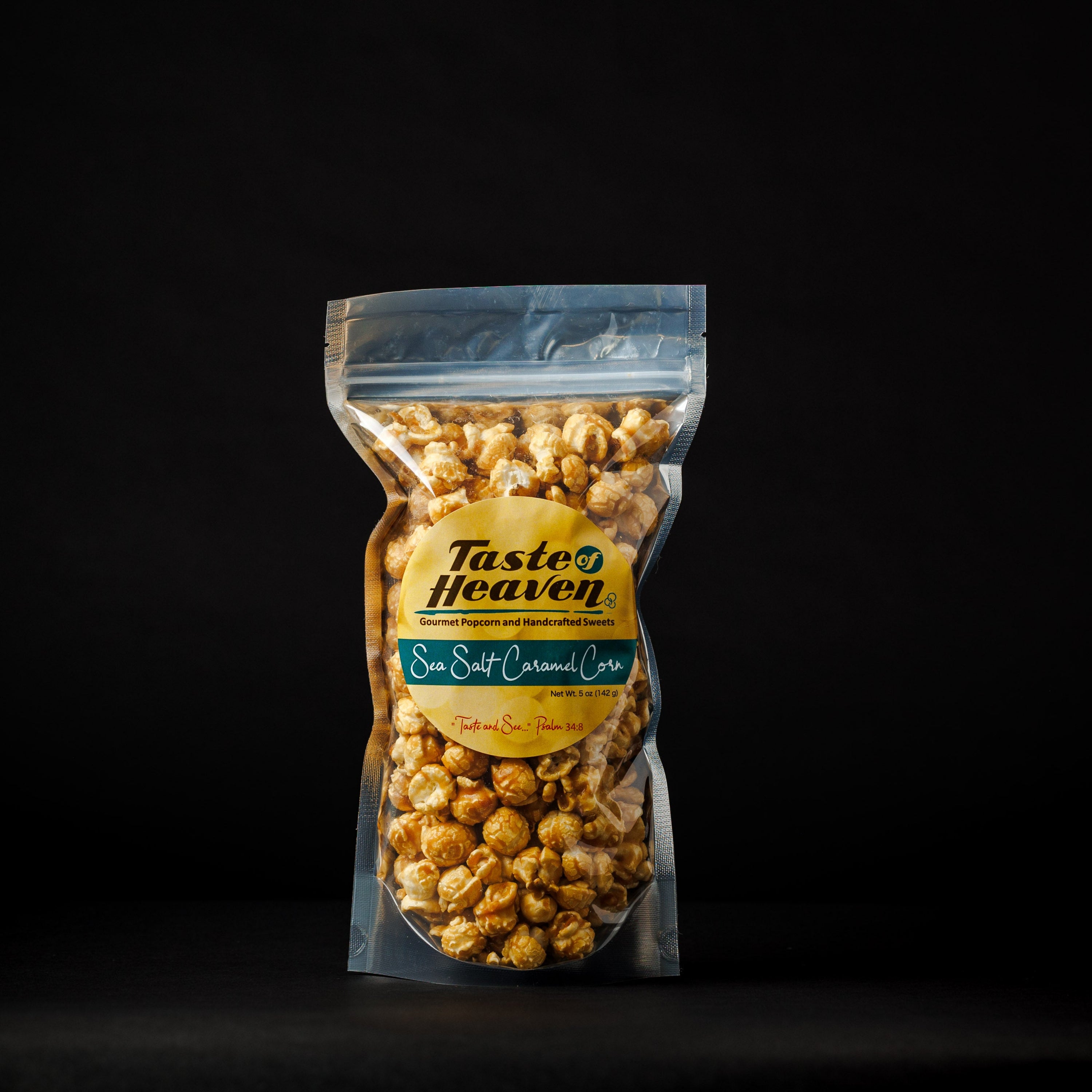 Multiple clear plastic bags of varying sizes filled with caramel corn, each labeled with the brand 'Taste of Heaven' and the product name 'Sea Salt Caramel Corn'.
